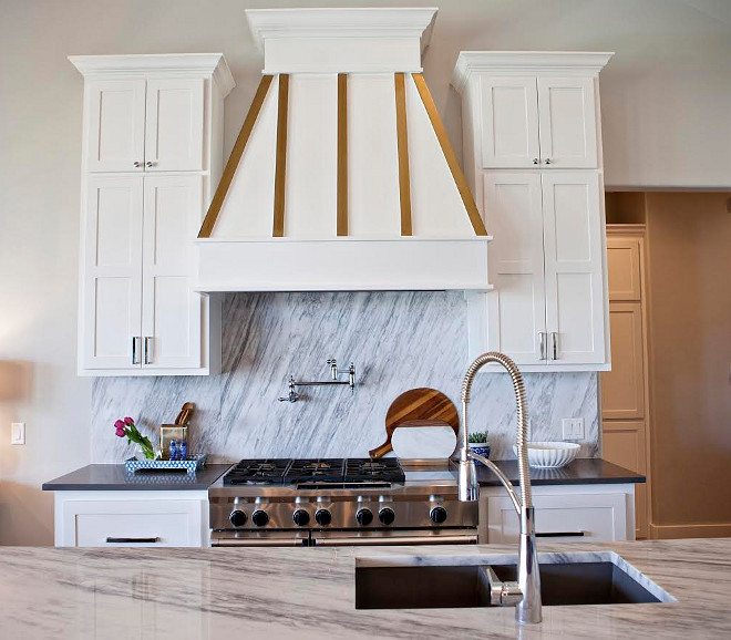 Hood. Kitchen hood. The hood range is accented beautifully in white and gold. kitchen-hood #kitchen #hood #range #hood Ivy House Interiors