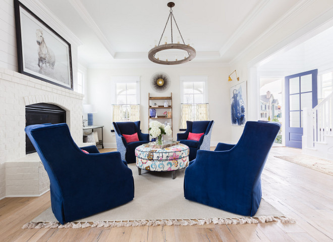 Blue and white living room. Blue and white living room with painted brick fireplace, white shiplap and light hardwood floor. #bluenadwhite #blueandwhitelivingroom #livingroom Blue and white living room. Redo Home and Design