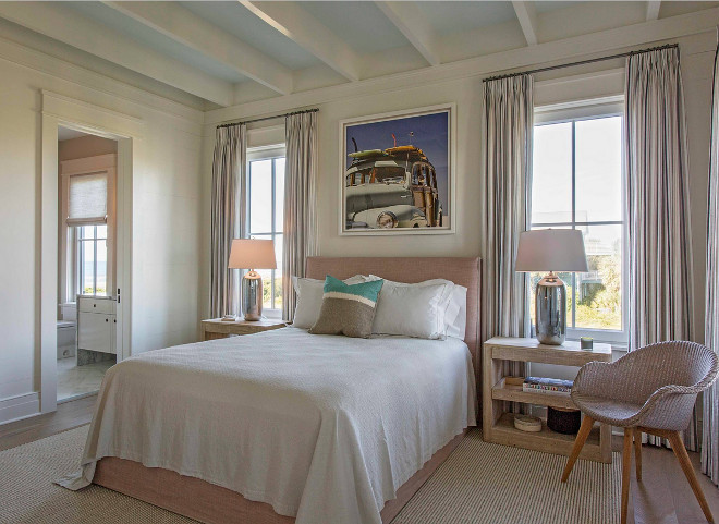 Neutral coastal bedroom. This bedroom features a gentle color palette, which is perfect for a seaside home. #bedroom #colorpalette #bedrooms neutral-coastal-bedroom Herlong & Associates Architects + Interiors