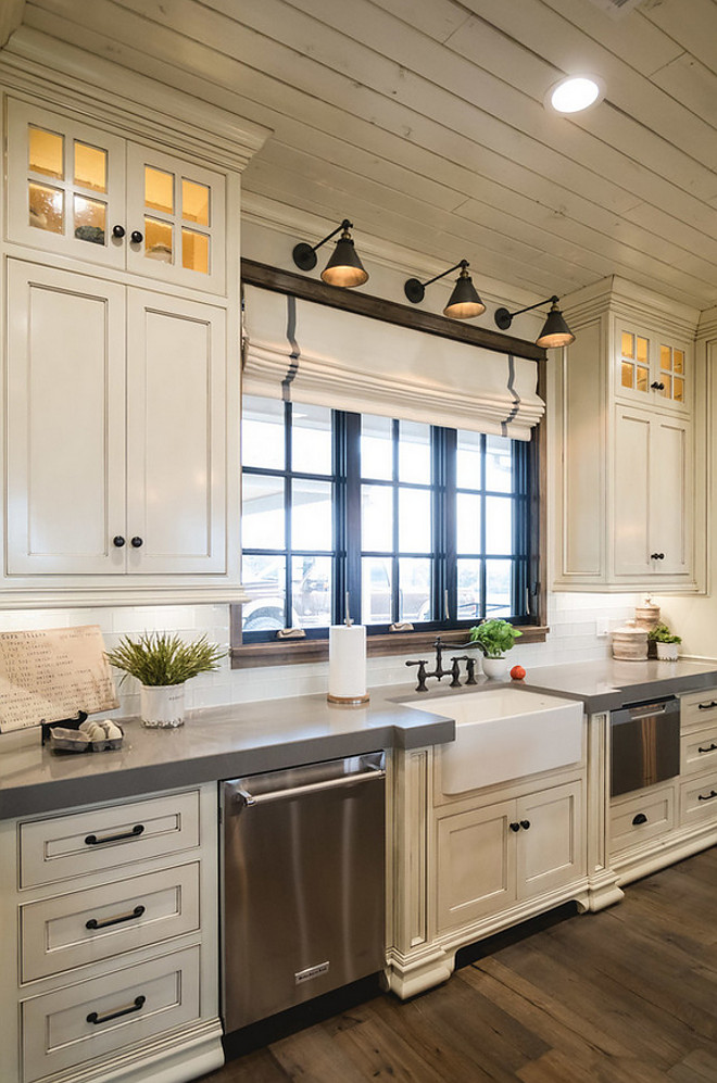 Off white kitchen with grey quartz countertop. The surrounding countertops are Grey Expo Quartz. #Offwhitekitchen #greyquartz #greyquartzcountertop off-white-kitchen-with-grey-quartz-countertop Alicia Zupan