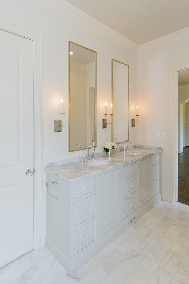 Pale Grey Bathroom Cabinet. Benjamin Moore OC-52 Gray Owl. Light Gray Dual Washstand with Tall Metal Mirrors. Benjamin Moore OC-52 Gray Owl Pale Grey Bathroom Cabinet. #PaleGreyBathroomCabinet #PaleGrey #BathroomCabinet pale-grey-bathroom-cabinet #BenjaminMooreOC52GrayOwl #BenjaminMooreOC52 #BenjaminMooreGrayOwl Tasha B. Davis Interiors, LLC.