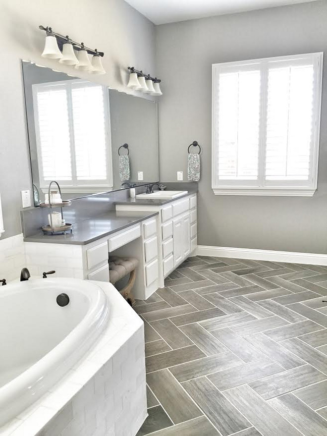 My master bathroom was the hardest area for me to design. I really loved these gray wood looking tiles in a herringbone pattern for the floors. Bathroom tile floor is Daltile EMSLEM EM03 Gray 7x20 laid Herringbone with #386 Oyster Gray grout.