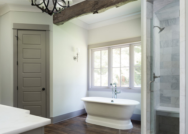 Bathroom with pale gray walls and grey trim and grey door. Bathroom with pale gray walls and grey trim and grey door ideas. #Bathroom #palegraywalls #greytrim #greydoor bathroom Willow Homes