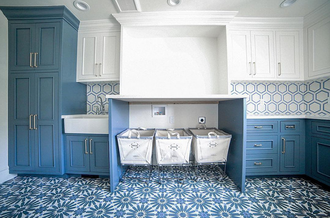 Blue and white laundry room. Blue and white laundry room tile. Blue and white laundry room cabinet. Blue and white laundry room paint color #Blueandwhitelaundryroom #Blueandwhite #laundryroom #Blueandwhitelaundryroomtile #Blueandwhitelaundryroompaintcolor #Blueandwhitelaundryroomcabinet Builder: Millhaven Homes. Interior: Four Chairs Design