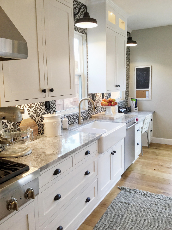 Farmhouse kitchen backsplash and countertop. Farmhouse kitchen with patterned tile backsplash and super white quartzite countertop. #Farmhousekitchen #Farmhousekitchenbacksplash #Farmhousekitchencountertop #patternedtilebacksplash #kitchen #farmhouse #superwhitequartzite #countertop #quartzitecountertop Jordan from @i_heart_home_design via Instagram.