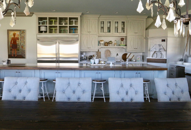 The cabinets feature custom doors and millwork with diamond pattern above doors and windows. Paint color is Benjamin Moore Revere Pewter. Home Bunch's Beautiful Homes of Instagram @artfulhomestead