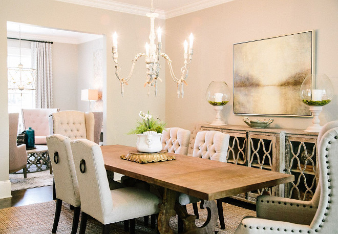 Neutral dining room with sitting area. Located just off the dining room, this sitting area is perfect to relax after a long dinner with friends. #diningroom #sitttingarea #entertaining neutral-dining-room Outrageous Interiors