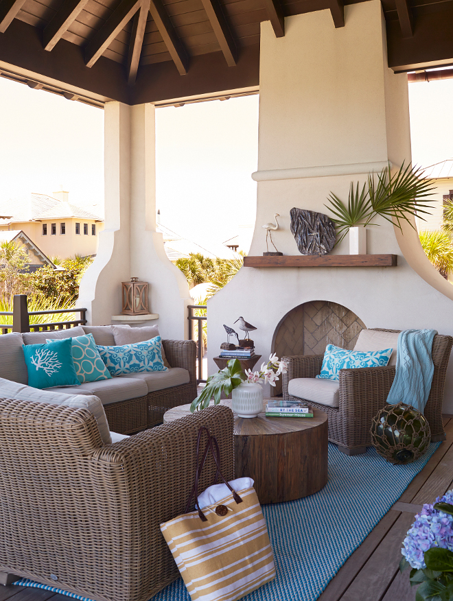 Porch. Porch fireplace and outdoor furniture. The second level features a wrapround porch with incredible Gulf views.