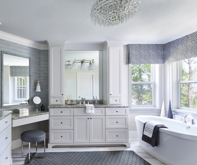White bathroom Cabinet paint color SW7014 Eider White by Sherwin Williams. Great white paint color for cabinets. White bathroom Cabinet paint color SW7014 Eider White by Sherwin Williams. #whitecabinet #paintcolor #SW7014EiderWhite #SherwinWilliams Vivid Interior Design