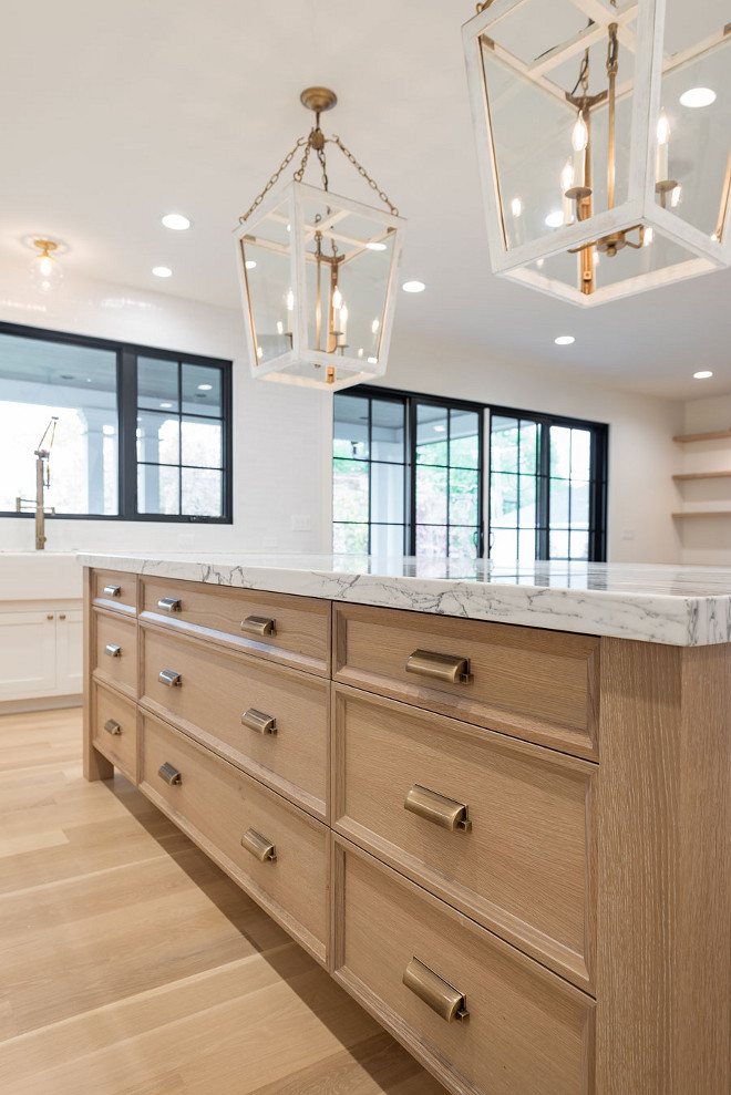 White oak rifted and quarted kitchen island. White oak rifted and quarted kitchen island and white oak flooring. #Whiteoak #Whiteoakisland #rifted #quarted #cabinet #kitchenisland white-oak-rifted-and-quartered-kitchen-island Caitlin Creer Interiors & @mariannebrown12. Northstar Builders, Inc. Photo by @lucycall.