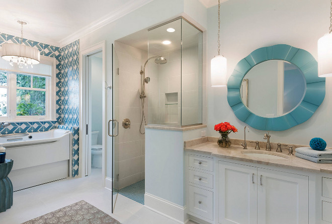 This bathroom feels feminine and fun. Can you guess the homeowner's favorite color? Turquoise looks great everywhere, doesn't it? Wall paint color is Benjamin Moore Winter Ice. 