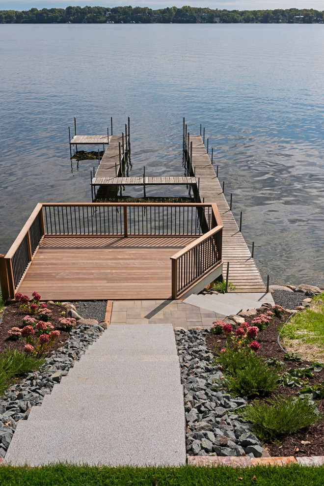 Steep lot dock. Great deck and dock idea for steep lots. #steeplots #steeplotideas #steeplotdock #steeplotdeck Stonewood LLC. Studio M Interiors. Spacecrafting Photography