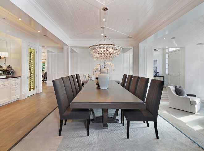 Dining room. The formal dining room is located between custom wine cellars and a living room. Dining room. Dining room <Dining room> #Diningroom Brandon Architects, Inc