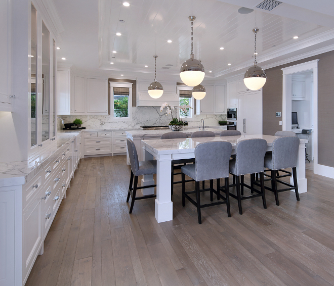 Kitchen two islands. Kitchen with two island. Kitchen with work island and eating island. Cabinets are paint graded Alder. Ceiling Treatment: T&G Semi-Gloss Lacquer Finish, painted in Dunn Edwards 380 White. Kitchen #Kitchen #islands Brandon Architects, Inc