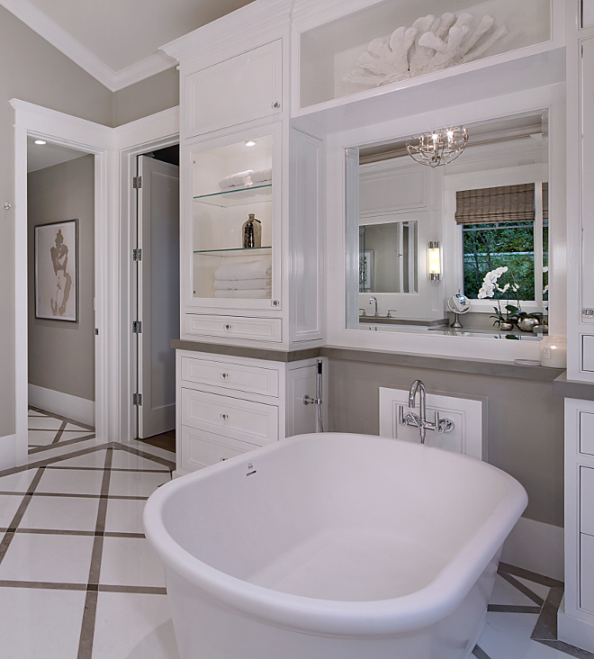Tub Cabinet. How to add storage in your bathroom by the bathtub. I love freestanding bathtubs but I am not a big fan of the lack of storage around them. A cabinet anchoring the tub resolves this problem. Tub Cabinet Ideas #Tub #Cabinet #Bathroomcabinet Brandon Architects, Inc