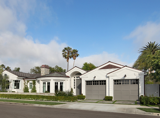 White Home exterior with grey front door and grey garage doors. White home exterior paint color is Benjamin Moore Simply White. White Home exterior with grey front door and grey garage door ideas. Grey door and grey garage paint color is Benjamin Moore HC-168 Chelsea Gray. White Home exterior with grey front door and grey garage doors #WhiteHomeexterior #greyfrontdoor #greygaragedoors #BenjaminMooreSimplyWhite #whiteExteriorpaintcolor #BenjaminMooreHC168ChelseaGray #BenjaminMooreChelseaGray Brandon Architects, Inc