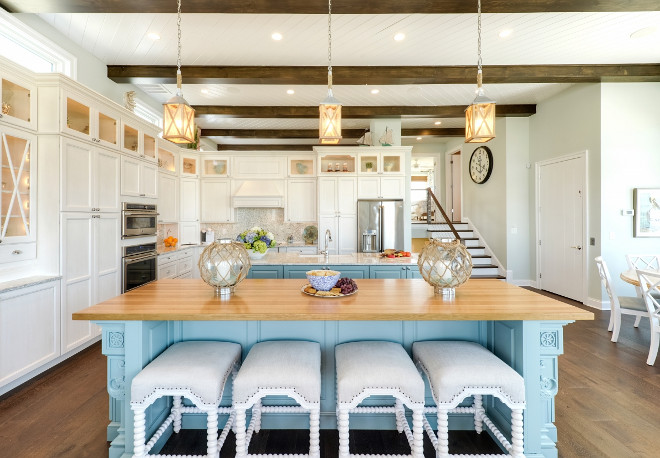 Coastal Kitchen. Coastal kitchen with turquoise islands and ceiling with exposed beams and herringbone shiplap. #Coastalkitchen #turquoise #Turquoiseisland #kitchenwithturquoiseisland#ceiling #exposedbeams #herringboneshiplap #herringbone #shiplap Echelon Interiors