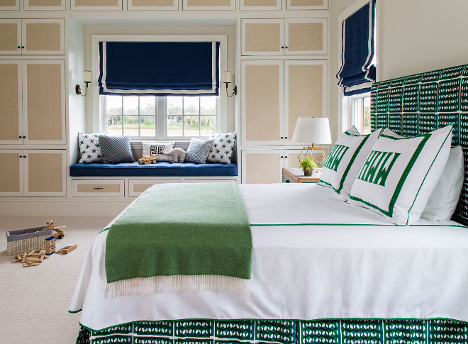 Green and Navy Bedroom. Beautiful and bold bedroom color scheme with green and navy fabrics. This green and navy color scheme is incredible and the built-in closet is a dream for any mom! The bed fabric is by Schumacher. #GreenandNavy #Bedroom #BeautifulBedroom #boldcolorscheme #bedroomcolorscheme #fabrics Andrew Howard Interior Design
