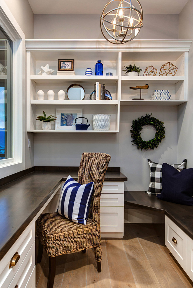 Home Office Built ins. Modern Farmhouse home office with built ins and blue and white decor. This home office by the kitchen is a great little space to enjoy the views and answer to emails. #Homeoffice #Smallhomeoffice #homeofficebuiltins #builtins Timberidge Custom Homes