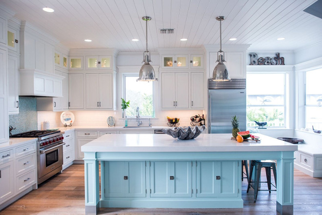 White kitchen with aqua island and tongue and groove ceiling boards. Coastal White kitchen with aqua island and tongue and groove ceiling #Whitekitchen #aquaisland #tongueandgrooveceiling Waterview Kitchens