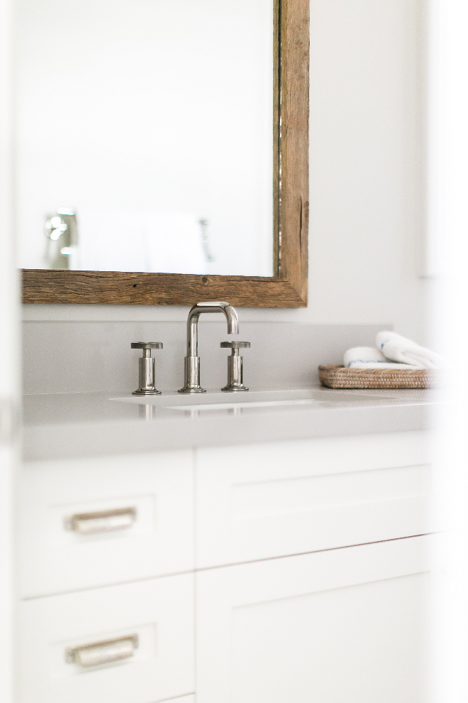 Kohler Purist Faucet. Bathroom features Kohler Purist Faucet and rustic reclaimed wood bathroom mirror. #KohlerPuristFaucet #Bathroom #Faucet #KohlerFaucet Patterson Custom Homes