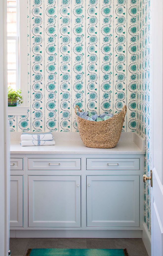 Laundry Room. Laundry room features turquoise and blue wallpaper and soft gray cabinets #LaundryRoom #LaundryroomWallpaper #turquoisewallpaper #turquoiseandbluewallpaper #softgraycabinets #softgraycabinet Andrew Howard Interior Design