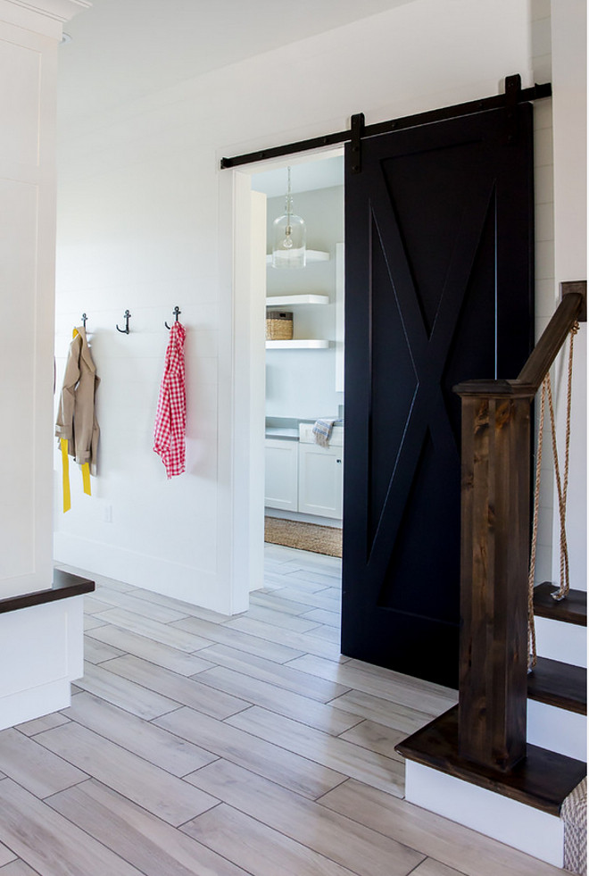 Laundry room Barn Door. Laundry room Barn Door and Staircase with rope railing. Laundry room Barn Door. Laundry room Barn Door #Laundryroom #BarnDoor #Roperailing Timberidge Custom Homes