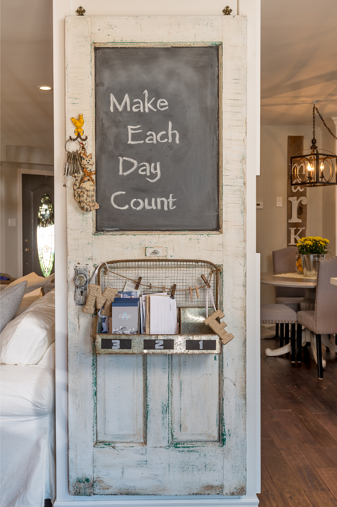 Reclaimed door. Found by the homeowner, this reclaimed door was hung and partly painted with chalk paint to create a message board. How creative is that?! #Reclaimeddoor #chalkpaint #farmhouse Hardcore Renos