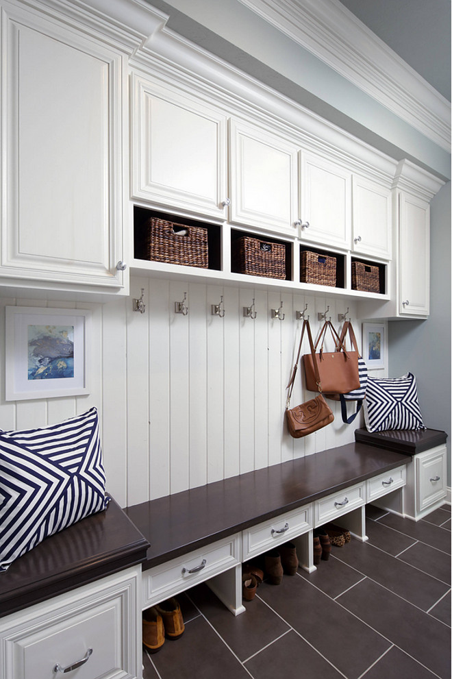 Mudroom Seating and Storage Layout. Floors are 12x24 gray ceramic tile. Mudroom Seating and Storage Layout Ideas. Mudroom Seating and Storage Layout. #Mudroom #MudroomSeating #MudroomStorage #MudroomLayout Barrington Homes Inc.