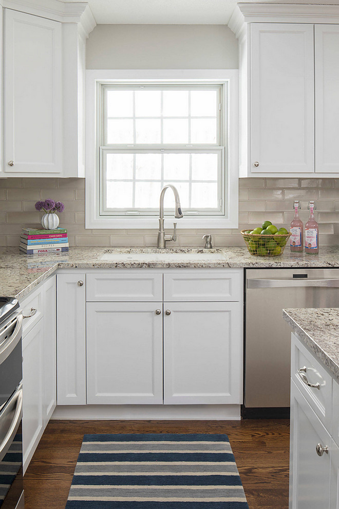 Neutral backsplash tile. This neutral tan subway tile backsplash works great with granite countertop. Backsplash is 3" x 9" Tan Ceramic Tile. Countertop is Ice Brown Granite. #neutralbacksplash #Neutralkitchen #tanbacksplash Martha O'Hara Interiors. Troy Thies Photography.