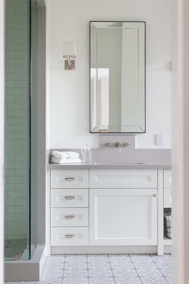 Restoration Hardware Bathroom Mirror. Cabinet paint color is Dunn Edwards Whisper. Countertop is Brushed French Grey Limestone slab. Restoration Hardware Bathroom Mirror Ideas #RestorationHardware #BathroomMirror Patterson Custom Homes