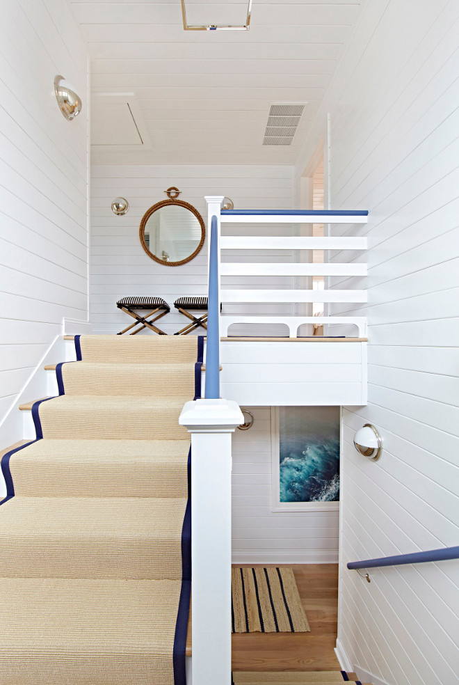 Shiplap Staircase. Shiplap Staircase Ideas. The staircase features shiplap wainscoting and sisal runner. Shiplap Staircase #ShiplapStaircase #Shiplap #Staircase #sisalrunner #staircaserunner Chango & Co.