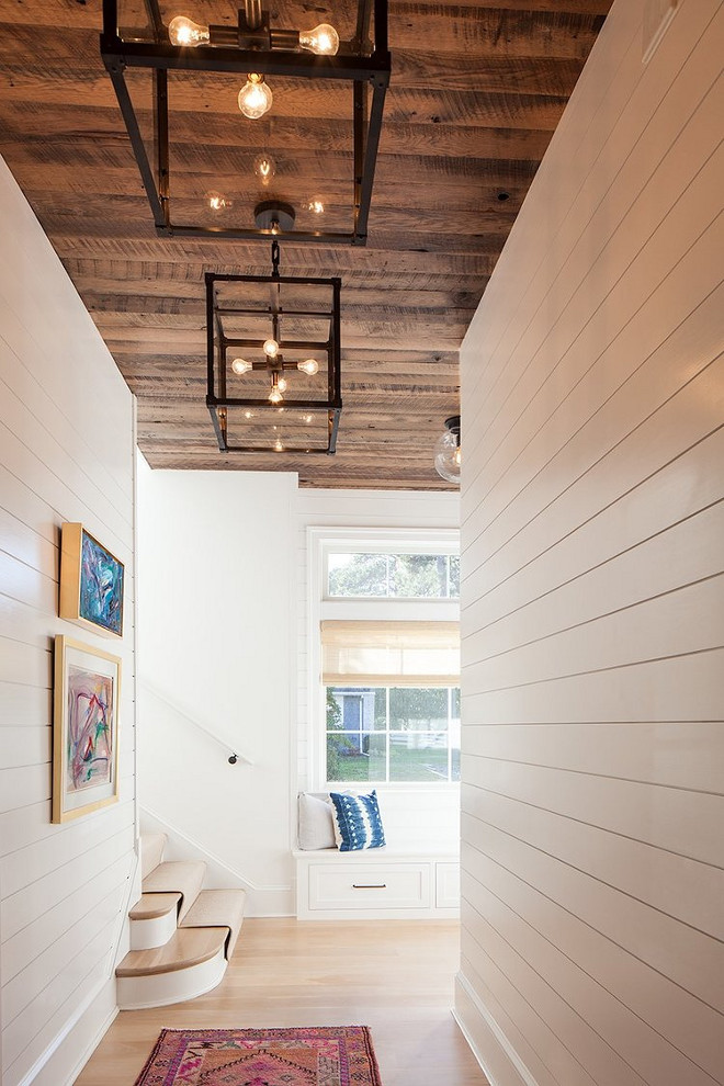 Hall with Shiplap walls and reclaimed shiplap wood ceiling. Hall with Shiplap walls, reclaimed shiplap wood ceiling and industrial lighting #Hall #Shiplapwalls #shiplap #reclaimedshiplapwoodceiling #reclaimedwoodceiling #industriallighting Victoria Balson Interiors