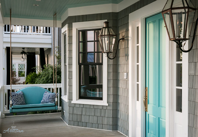 Turquoise and Gray Home Exterior. Home with grey shingles and turquoise teal front door and ceiling paint color. #Turquoisefrontdoor #Turquoiseporch #Grayexterior #HomeExterior Artisan Signature Homes. Interiors by Gretchen Black.