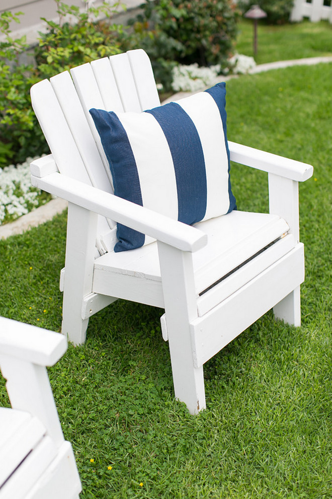 White Adirondack Chair. White Adirondack Chair with Blue and White Striped Pillow. White Adirondack Chair #WhiteAdirondackChair #WhiteAdirondackChairs AGK Design Studio. Ryan Garvin Photography.