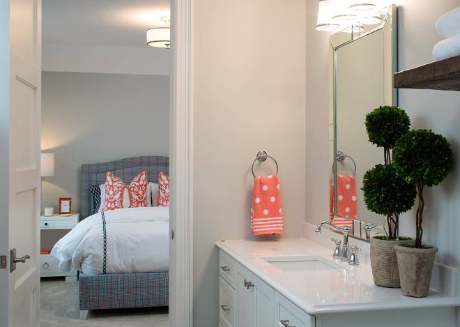 Bedroom ensuite, The guest bathroom features a white quartz countertop and a vanity painted in Benjamin Moore OC-17. Wall color is Benjamin Moore 1479 Alaskan Husky Guest Bedroom ensuite, Bedroom ensuite ideas, Bedroom ensuite color palette, Bedroom ensuite layout, Bedroom ensuite color scheme #Bedroomensuite #GuestBedroomensuite #GuestBedroomensuiteideas #GuestBedroomensuitecolorpalette #GuestBedroomensuitelayout #colorscheme Grace Hill Design