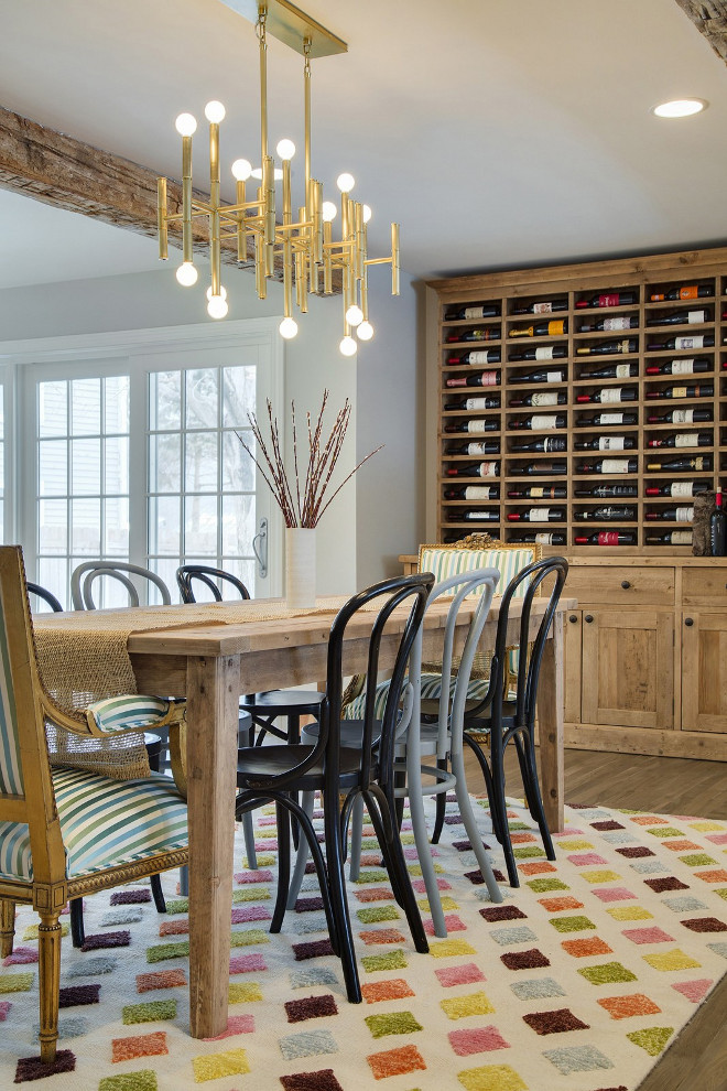 The dining room features a built-in hutch with wine rack. #diningroom #builtinhutch #winerack Revision LLC