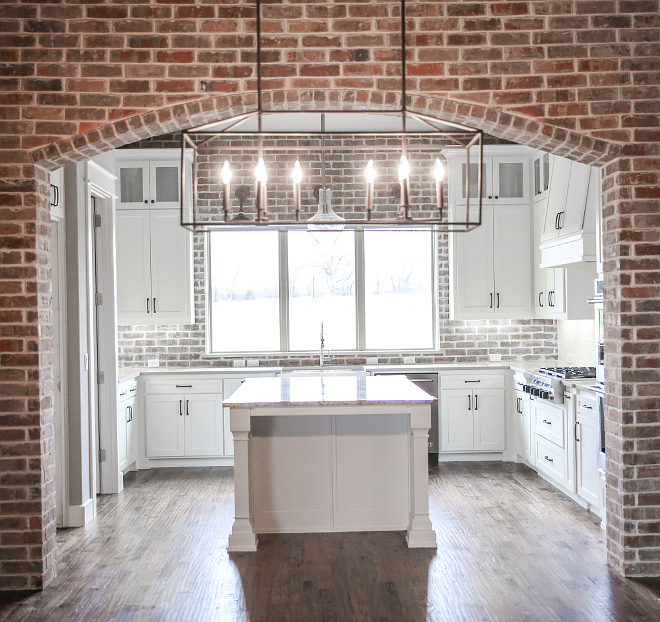 White Farmhouse Kitchen With Brick Backsplash White Farmhouse Kitchen With Brick Backsplash