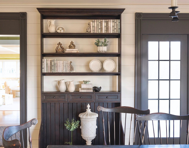 Farmhouse dining room hutch. Farmhouse hutch. Open shelves allow the shiplap wall serve as back to this farmhouse-inspired hutch. Farmhouse dining room with shiplap and farmhouse hutch #Farmhouse #diningroom #hutch #Farmhousehutch #Farmhousediningroom #shiplap #farmhouse #hutch Home Bunch's Beautiful Homes of Instagram @loveyourperch