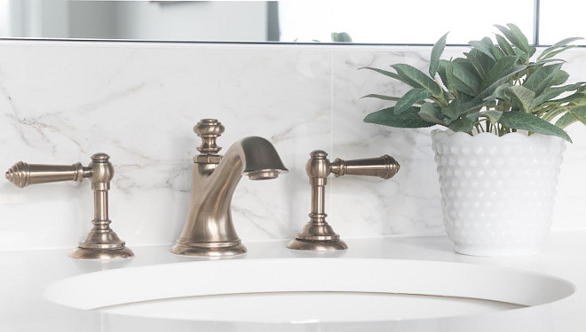 Bathroom faucet Kohler Artifacts, Brushed Bronze, w/ Lever Handles. Beautiful Homes of Instagram @greensprucedesigns