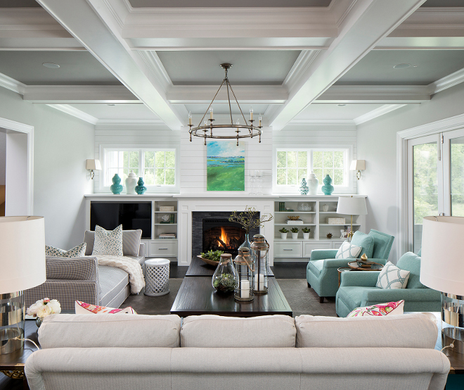Living room with shiplap fireplace, half wall cabinets, window above cabinets and coffered ceiling #Livingroom #shiplap #Shiplapfireplace #halfwallcabinets #windowabovecabinet #cofferedceiling Grace Hill Design