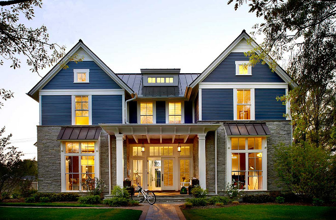 Modern Farmhouse Exterior. Non-white farmhouse. Modern farmhouse exterior can be painted in other colors beside white, this navy exterior works beautifully with the stone #modernfamrhouse #farmhouseexterior #farmhouseexteriorpaintcolor #farmhousestone #modernfamrhouseexterior #modernfamrhousepaintcolor #farmhouse Charles Vincent George Architects, Inc