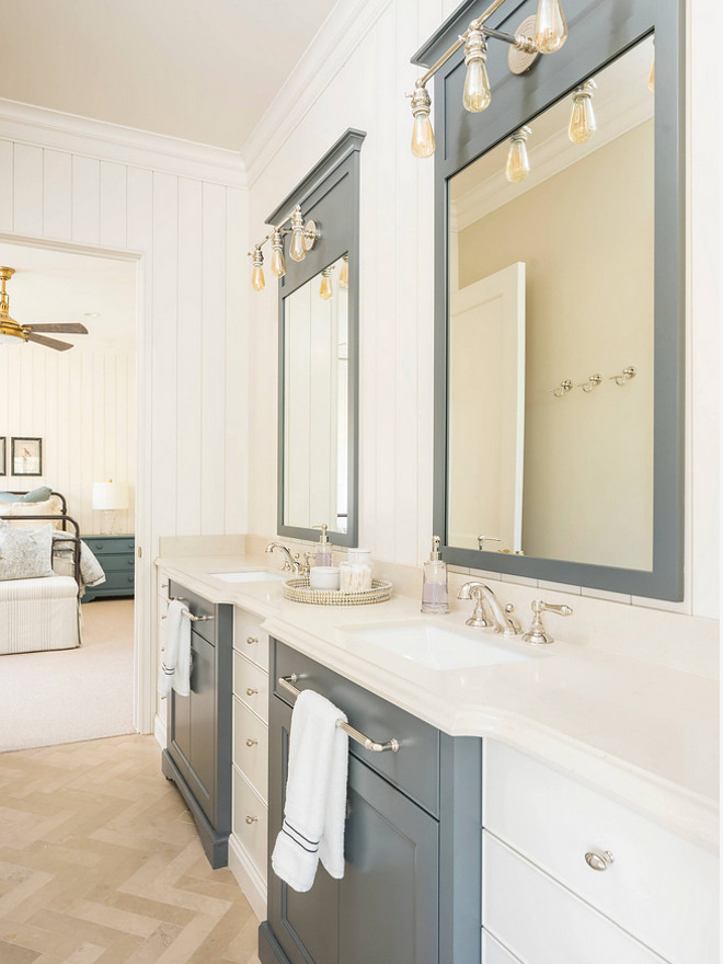 Two toned bathroom cabinet. Similar cabinet paint color: Sherwin Williams SW6221 Moody Blue and Sherwin Williams Alabaster. Two toned bathroom cabinet with painted mirror frames. Two toned bathroom cabinet. #Twotoned #bathroomcabinet #paintedmirrorframe Jackson and LeRoy