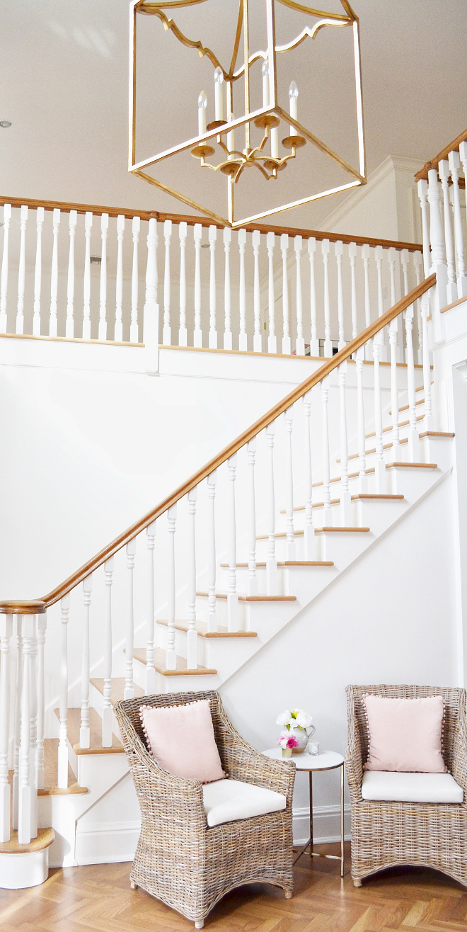 Benjamin Moore Simply White. Walls, trim and staircase spindles paint color is Benjamin Moore Simply White. I chose the same color for the walls and moldings in this white because I like its crisp clean look #BenjaminMooreSimplyWhite Beautiful Homes of Instagram @HomeSweetHillcrest