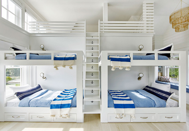 Bunk room with loft, Bunk room with four beds, storage under bunk beds and a built in ladder between bunk beds to a loft #Bunkroom #Loft #Bunkroomloft #fourbunkbeds #bunkbedstorage #bunkroomladder #bunkbedladder #builtinladder Chango & Co