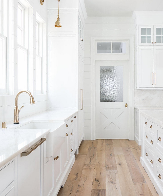 Kitchen Flooring. Kitchen Hardwood Flooring. Floors are European French white oak with a white stain and water based finish. The cross hatch door was custom made by a local wood shop. #kitchenflooring #flooring #hardwoodflooring #EuropeanFrenchwhiteoak #whiteoak Artisian Signature Homes. Gretchen Black Interior Designer