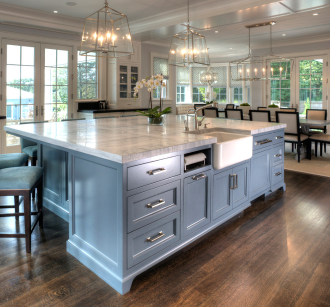 Kitchen Island. Kitchen Island. Large Kitchen Island with farmhouse sink, paper towel holder, Super White Quartzite Countertop and furniture-like cabinet. Kitchen Island #kitchenisland #kitchen #island East End Country Kitchens
