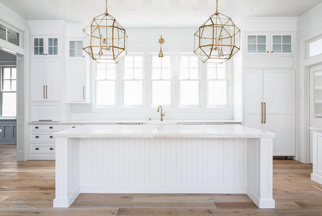 Kitchen lighting. Brass Kitchen Lighting. Brass Kitchen Lighting above island and above window. Suzanne Kasler Morris Lantern in Gilded Iron. Brass arm lights over the sink are from Savoy house #SuzanneKasler #MorrisLantern #GildedIronMorrisLantern #Kitchenlighting #kitchen #lighting #brasslighting #BrassKitchenLighting #Brass #Kitchen #Lightingaboveisland #Lightingabovewindow Built by Artisan Signature Homes. Interior Design by Gretchen Black from Greyhouse Design