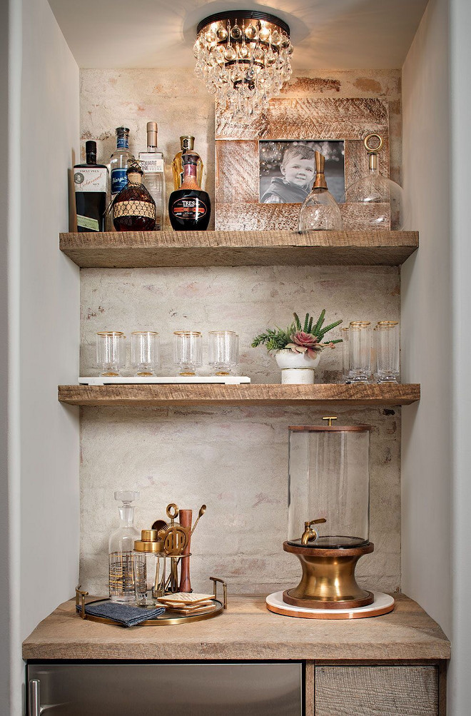 Rustic Farmhouse Wet Bar Butlers Pantry. Rustic Farmhouse Wet Bar Butlers Pantry with white brick wall and reclaimed wood shelves. Farmhouse wet bar with white brick wall and reclaimed wood shelves. The accent ​brick wall features a whitewash over the brick and it’s done with grout washing not paint. Rustic Farmhouse Wet Bar Butlers Pantry #RusticFarmhouseWetBar #RusticFarmhouseButlersPantry #RusticWetbar #Farmhousebutlerspantry Tracy Lynn Studio
