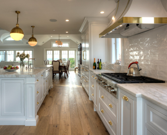 Soft Grey Kitchen with Brass accents and white oak hardwood floor. Soft Grey Kitchen with Brass accents and white oak hardwood floor. Soft Grey Kitchen with Brass accents and white oak hadrwood floor #SoftGreyKitchen #KitchenBrassaccents #GreyKitchenwithbrass #whiteoak #hardwoodfloor East End Country Kitchens